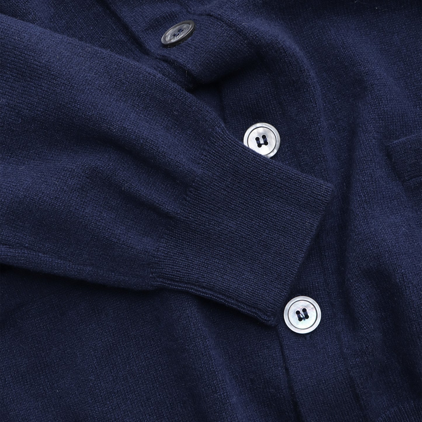 Lugano Cardigan Navy — button and collar detail