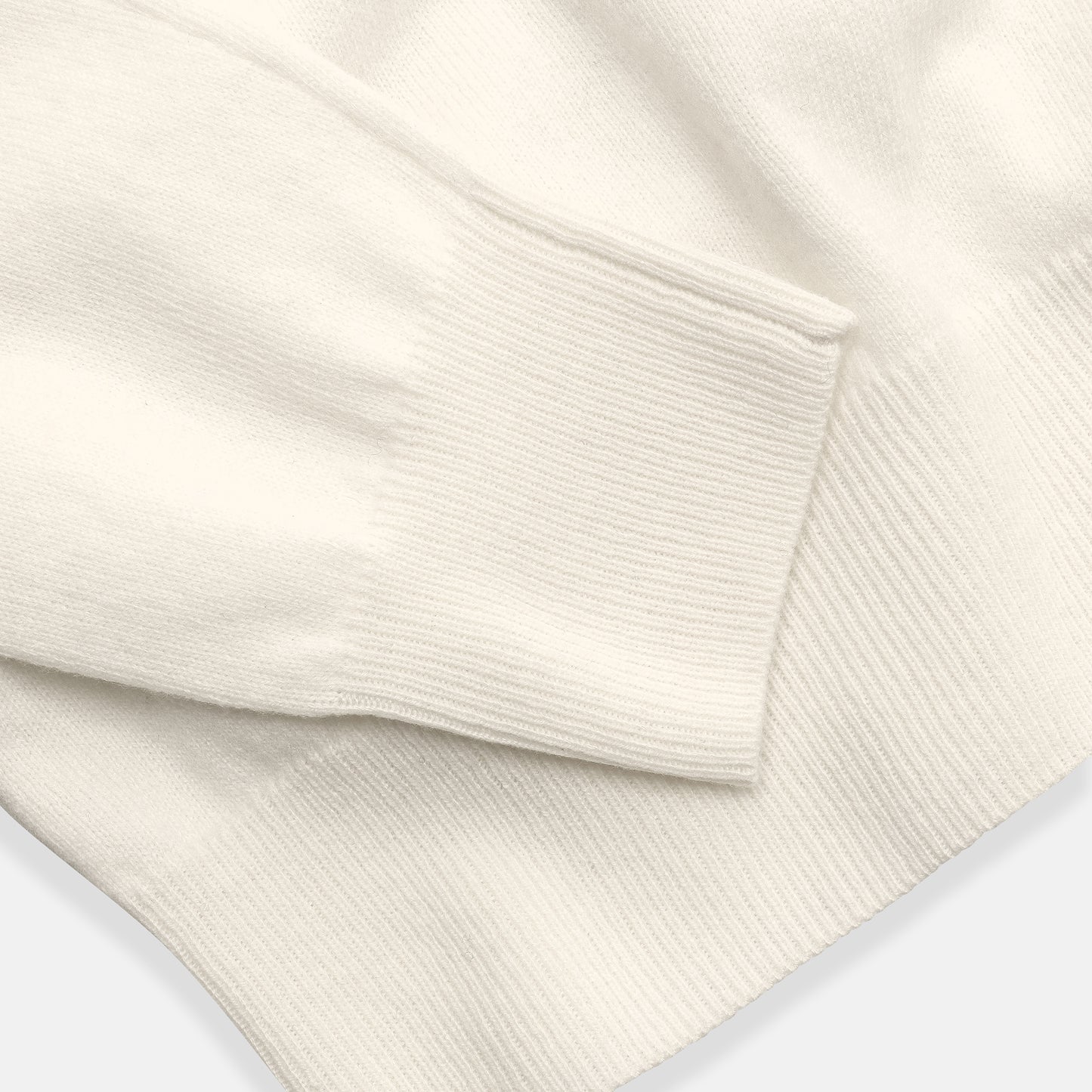 Napolitano Turtleneck Milk — ribbed cuff and hem detail